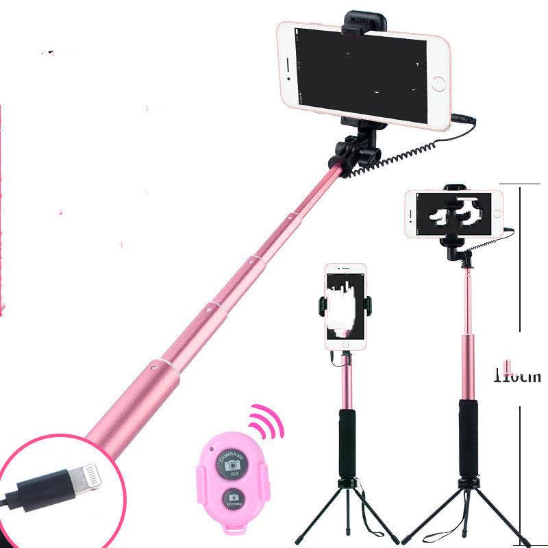 Rose gold aluminum alloy selfie stick compatible with iPhone, includes Bluetooth remote and tripod.