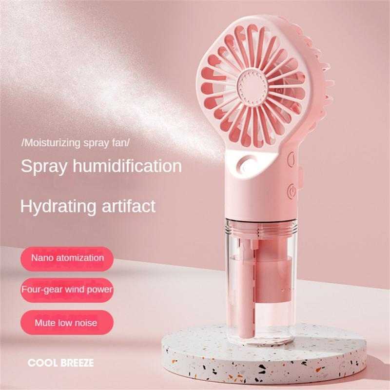 Small pink humidification fan with spray feature, USB charging, four-speed settings, and nano atomization technology.