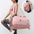 Large pink women's gym bag with multiple compartments and waterproof design.