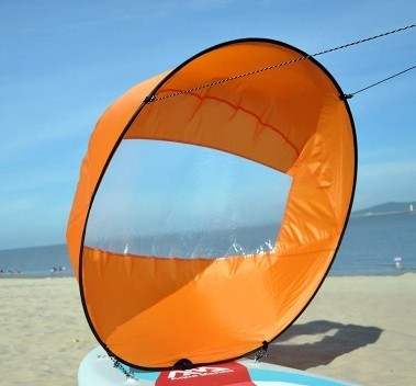 Folding sail for kayaking and paddle boarding with high-visibility PVC window.