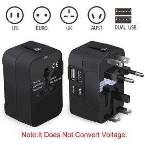 Multi-function travel adapter with US, Euro, UK, AUS plug compatibility and dual USB ports.