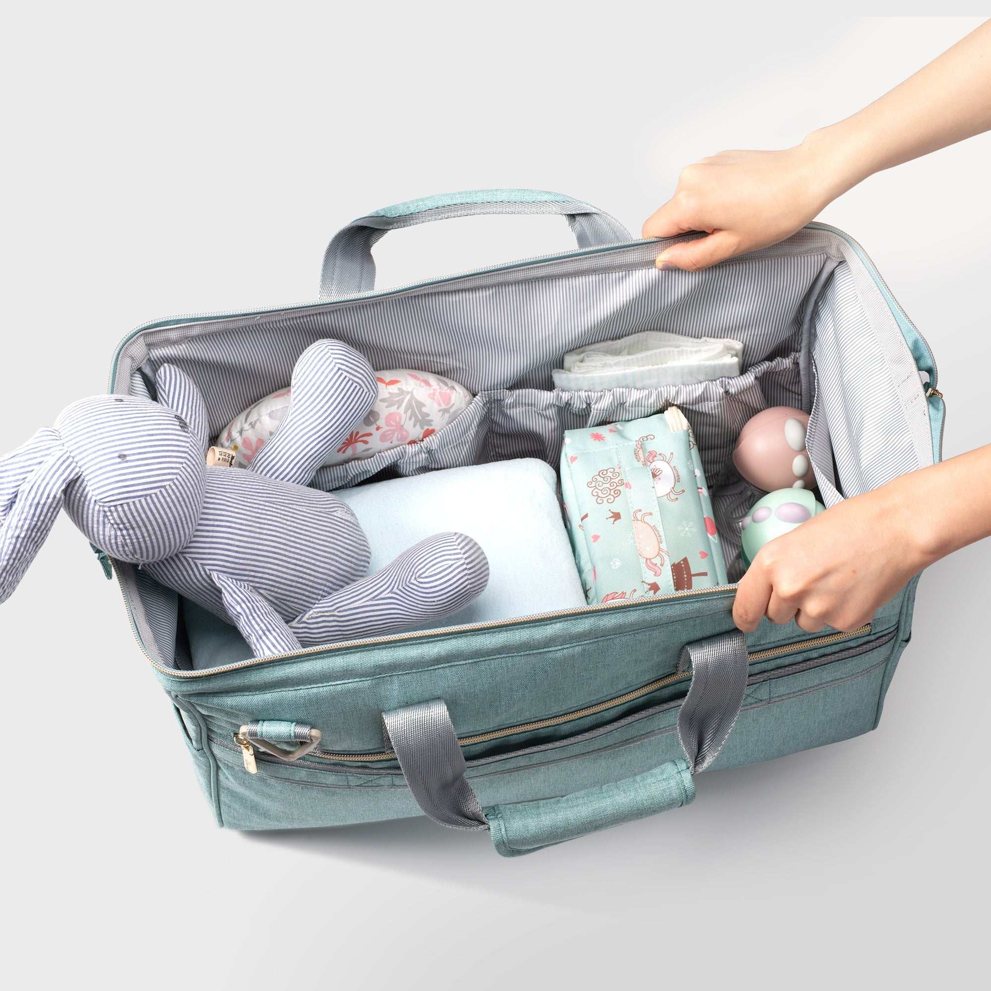 3 in 1 weekender travel luggage with spacious interior and multiple pockets for baby essentials.